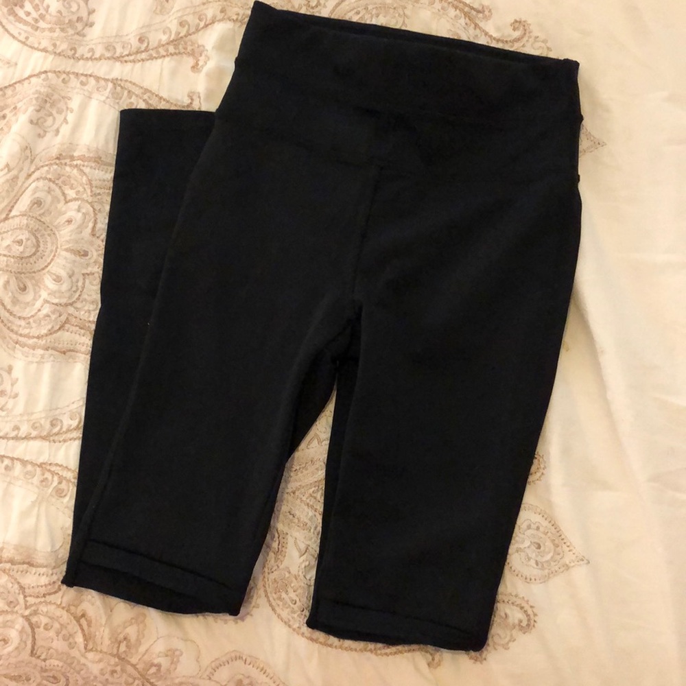 black free people leggings with knee detailing